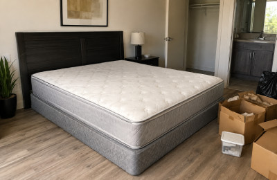 Property turnover mattress removal service in a bedroom